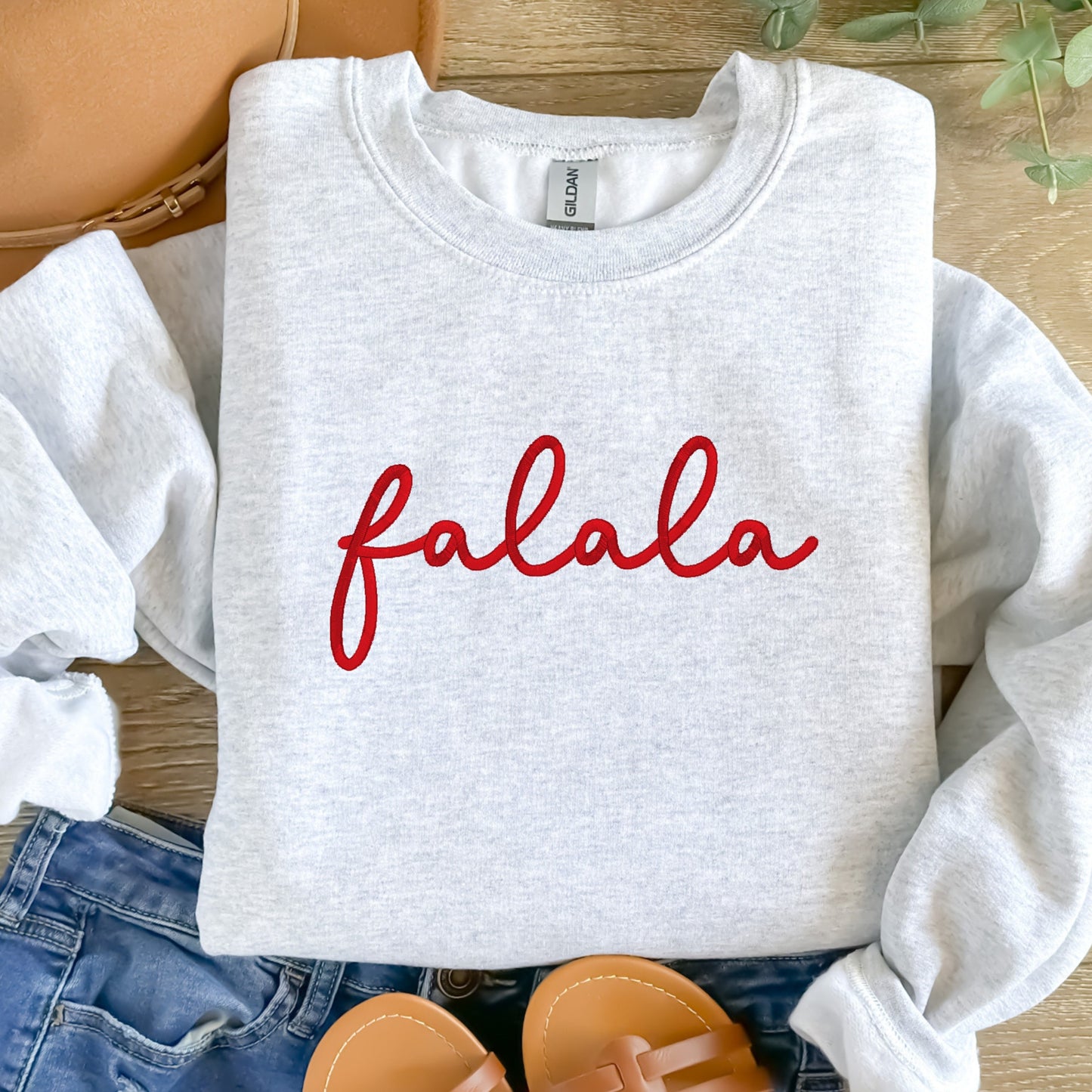 Embroidered Cozy Christmas Fleece Lined Crewneck with Bold Falala Embroidered In Red.