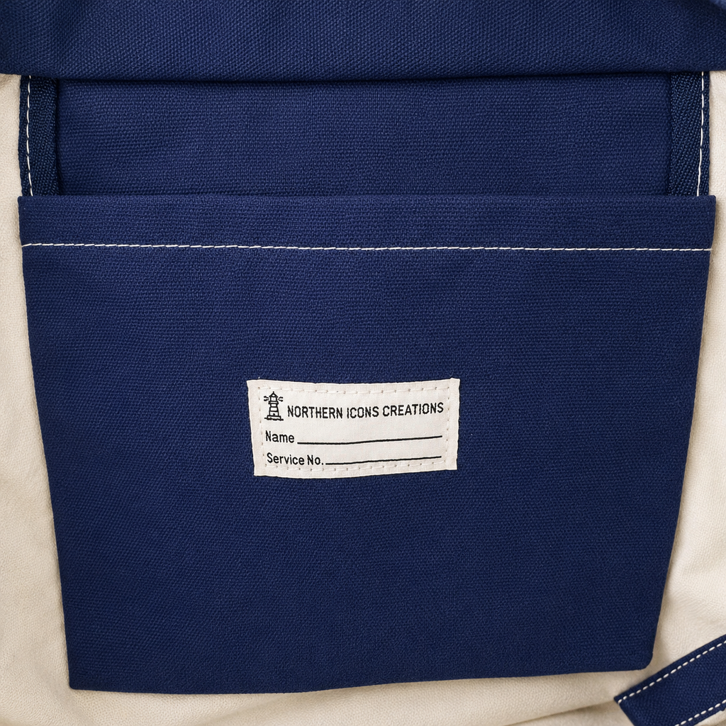 Interior canvas pocket with sewn-in name label inside snowboard tote