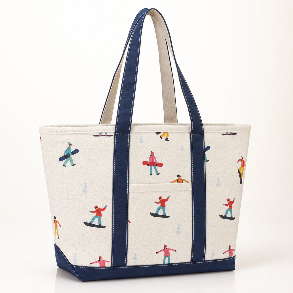 White and navy snowboard canvas tote shown at a three-quarter angle