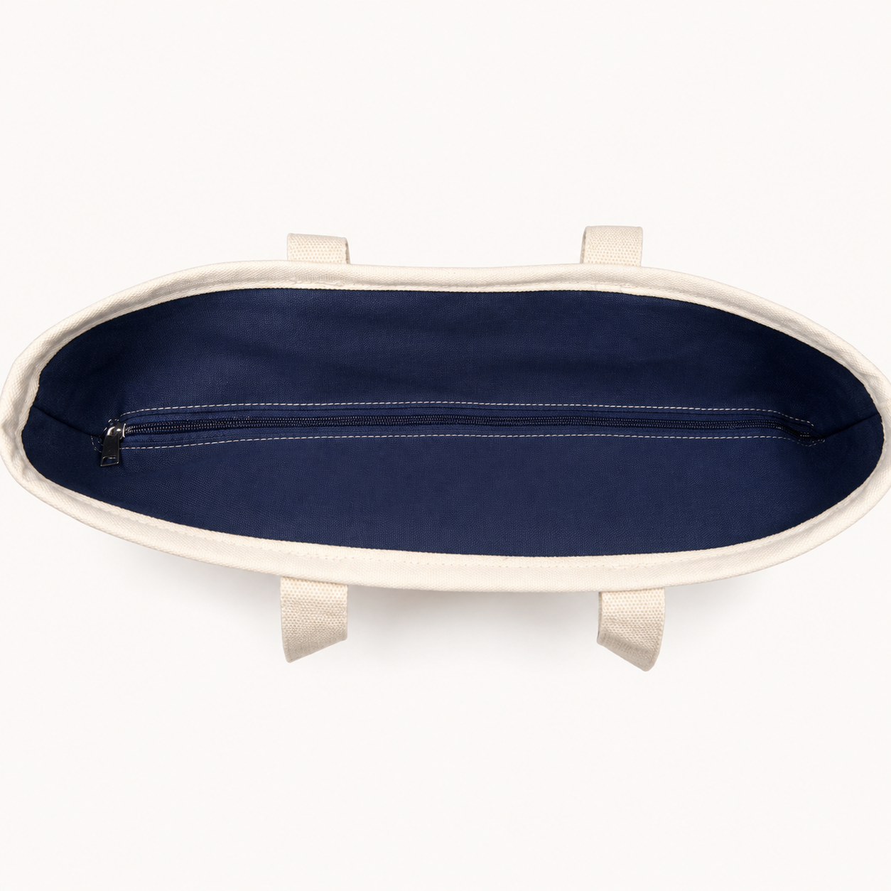 Overhead overview of the snowboard tote's secure navy sip-top closure