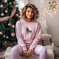 Women's Christmas Sweatshirt in pink embroidered with a red truck and a Christmas tree on the front chest.
