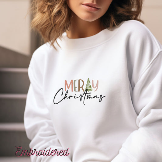 Merry Christmas embroidered onto white fleece lined crewneck sweatshirt.