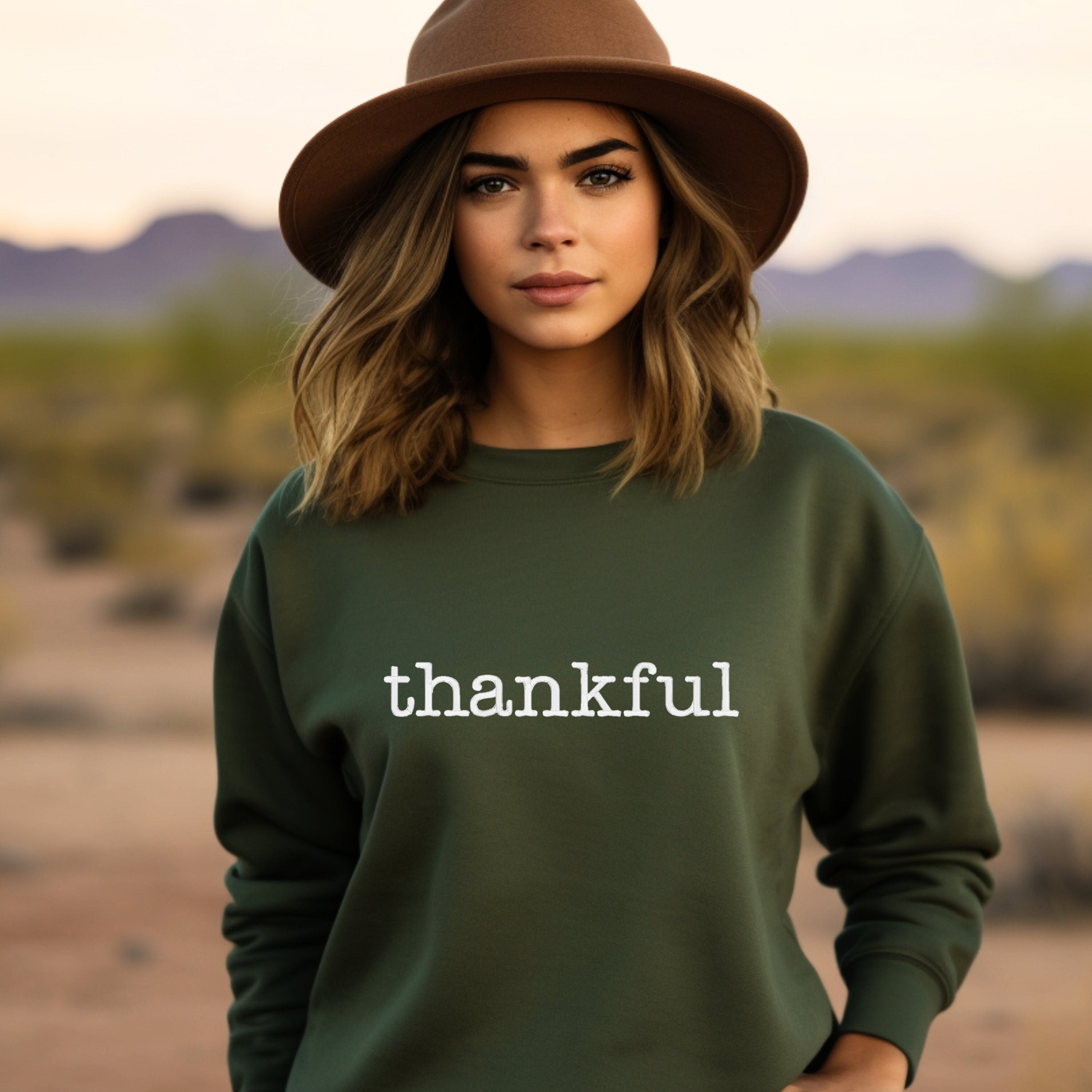 Military Green Sweatshirt with White & &quot;Thankful&quot; embroidered on the front.