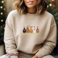 Christmas Chickens embroidered onto a stone fleece lined crewneck sweatshirt