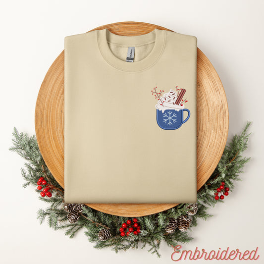 Clue Christmas Cup embroidered onto left chest area on a stone fleece lined crewneck sweater